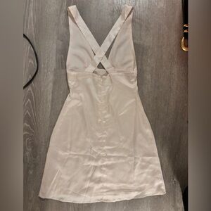 White fox dress in an off white with a sleek silky yet durable material.